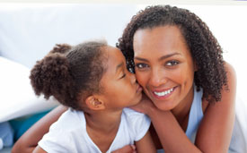 Daughter Kissing Mom